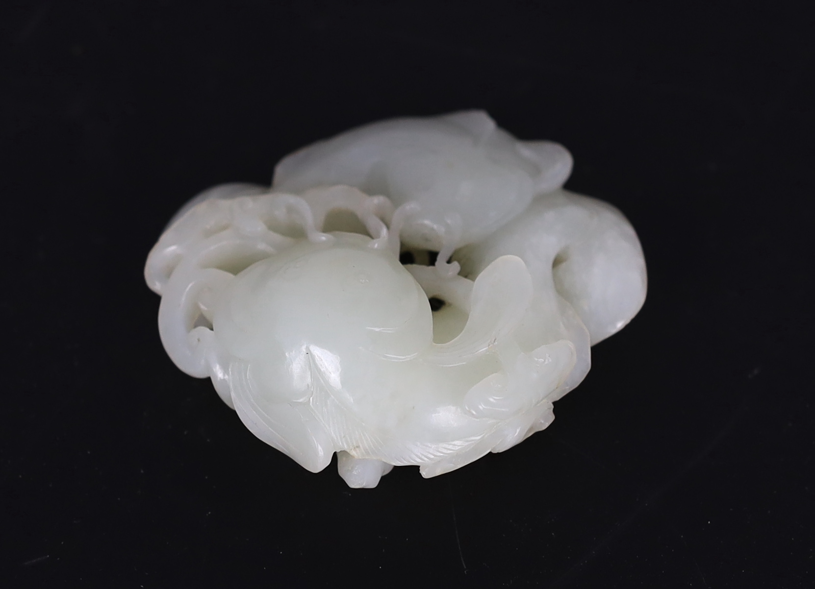 A Chinese white jade group of two catfish, 18th century